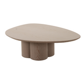 Contemporary Wyler coffee table featuring organic round form and petal-inspired base for modern interiors.